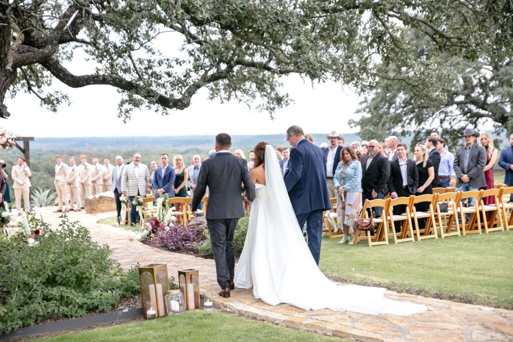 Bride walking to the altar at outdoor wedding venue near Azle TX.