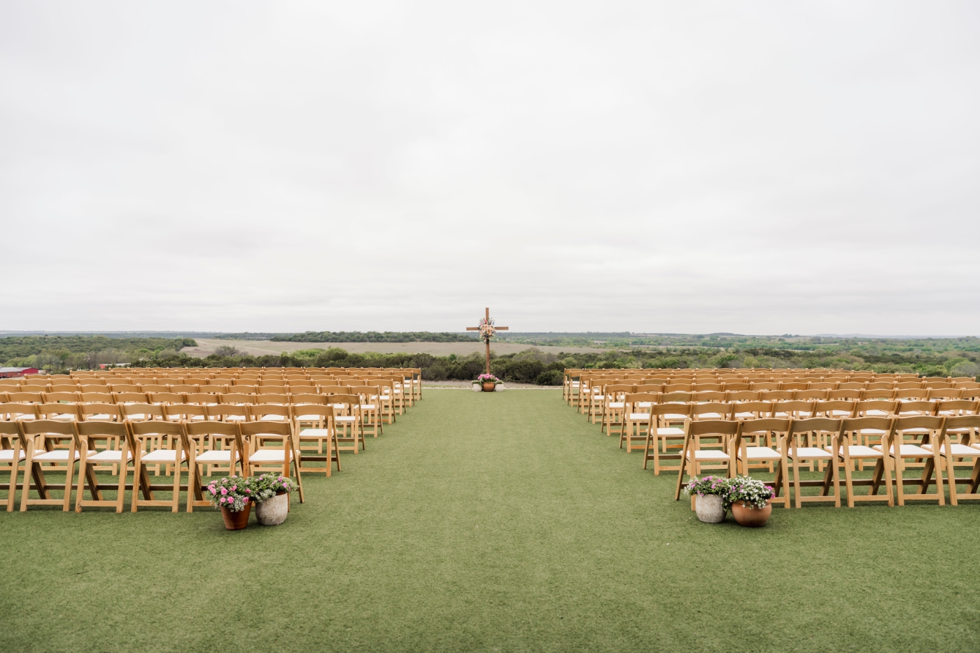 A large Texas wedding ceremony overlooking the Texas Hill Country