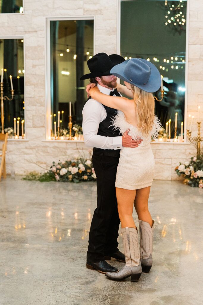 Newlyweds dancing at their Diamond A Ranch wedding reception.