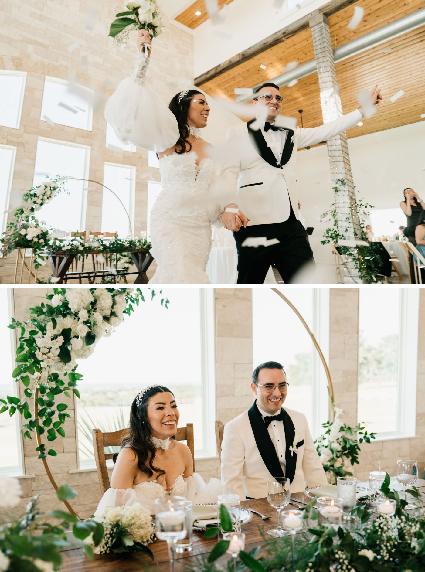 A bride and groom sit at a sweetheart table in front of large cathedral windows